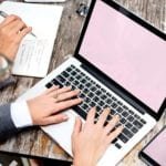 Businesswoman Using a Laptop Mockup BusinessWoman Using a Laptop Mockup