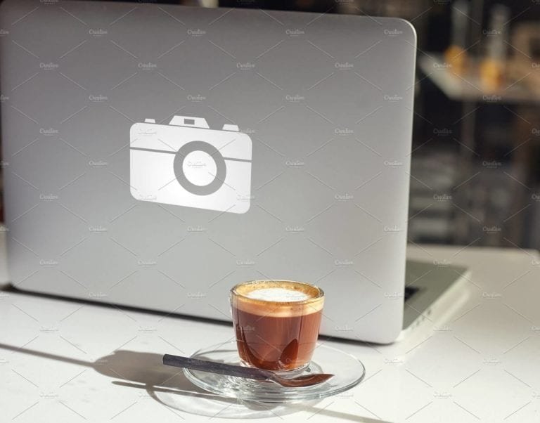 Complete Front View Modern laptop and coffee Cup Mockup