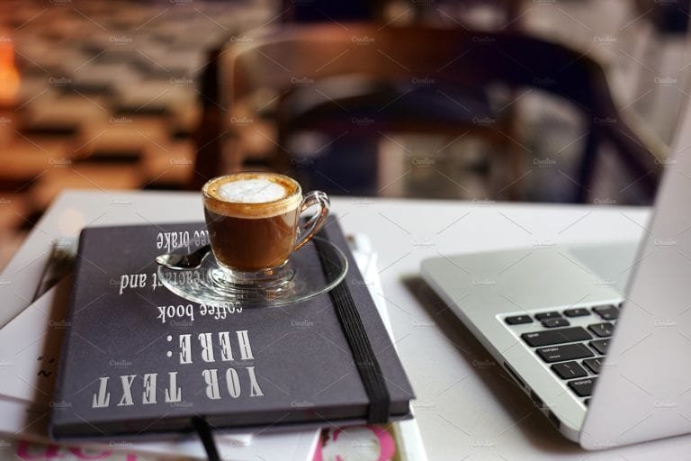 downloadable Modern laptop and coffee cup Mockup - mockup den