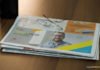 Free High resolution Photorealistic Half Folded Newspaper Mockup