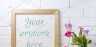 Wooden square frame mockup with flower