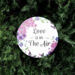 Free Round paper mockup on leaves background