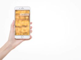 Female Left Hand holding iPhone 8 Mockup