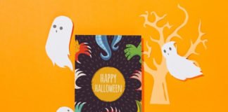 Free Psd Halloween cover mockup with monster hand and ghost