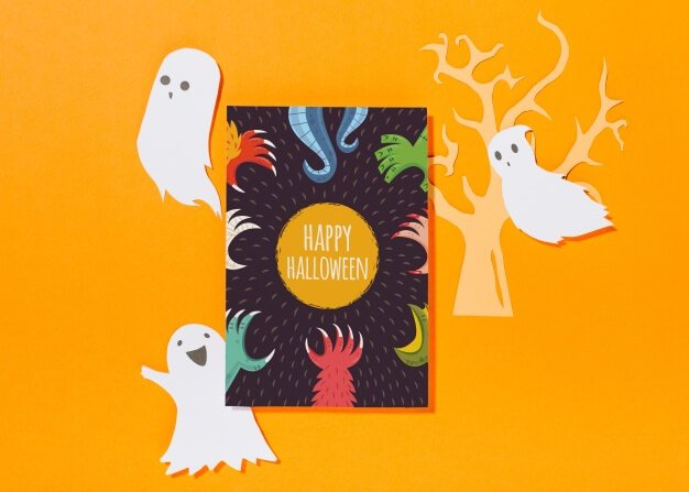 Free PSD Halloween cover mockup with monster hand and ghost