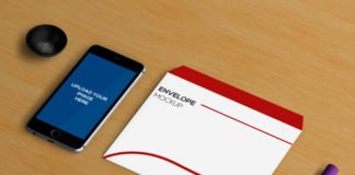 Free PSD smartphone mockup with envelop and marker