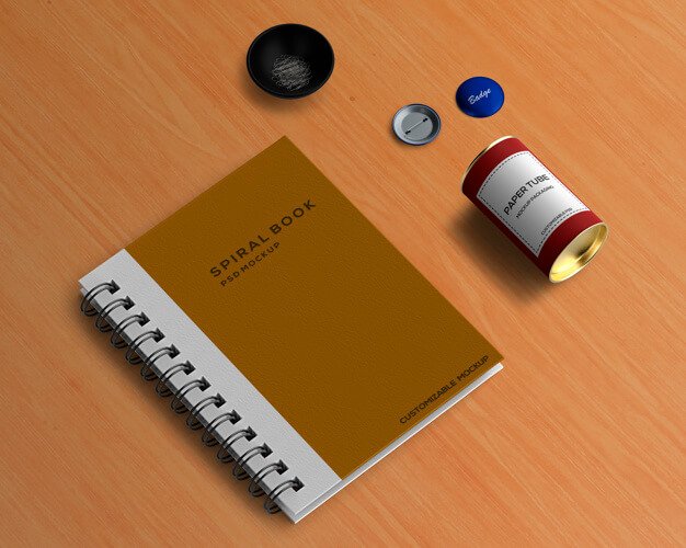 Free PSD Spiral book mockup with Office Stationery items
