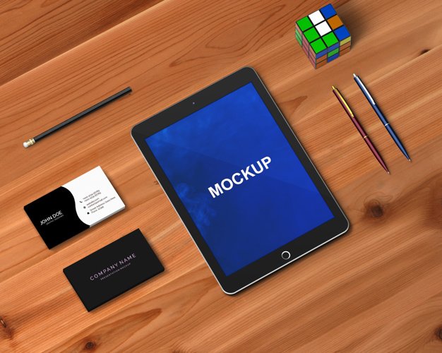 Free PSD Tab Mockup with pen and Puzzle items