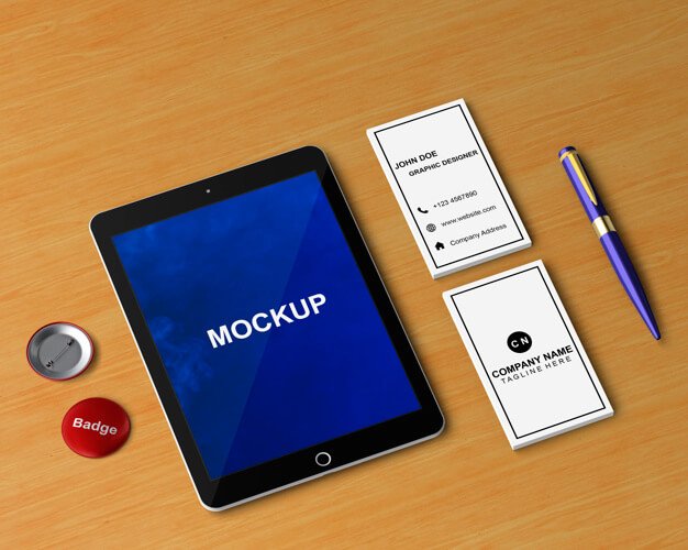 Free PSD Tablet mockup with pen and other items