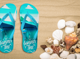 Free Flipflop Kept On Sea Beach Mockup Design