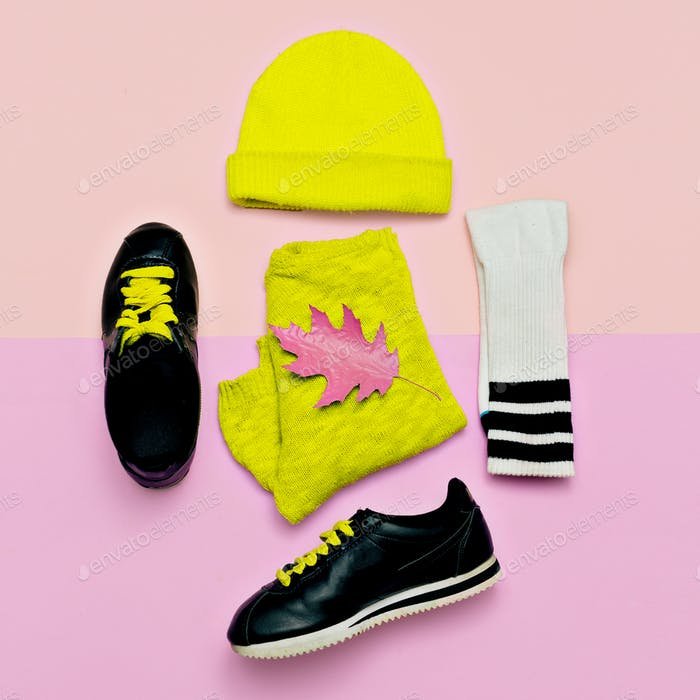 A Yellow Colored Beanie Is Placed With Some Other Accessories PSD Template
