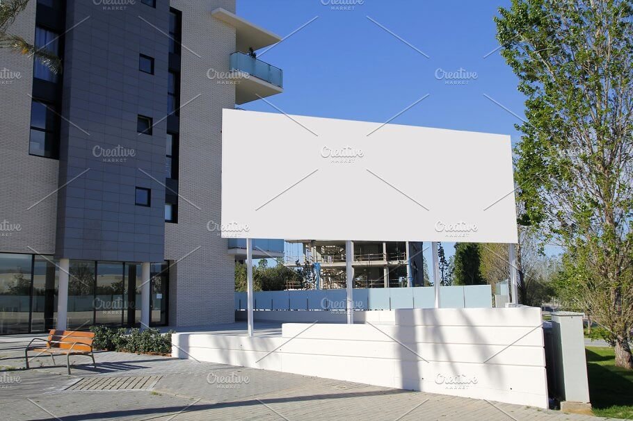 Blank Signage Board In Front Of Building Mockup