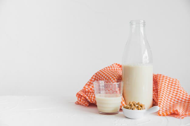 Milk Bottle With Some Cereals And A Glass PSD File