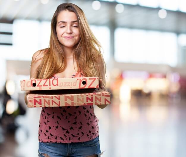 Teen holding two pizza boxes Picture Mockup