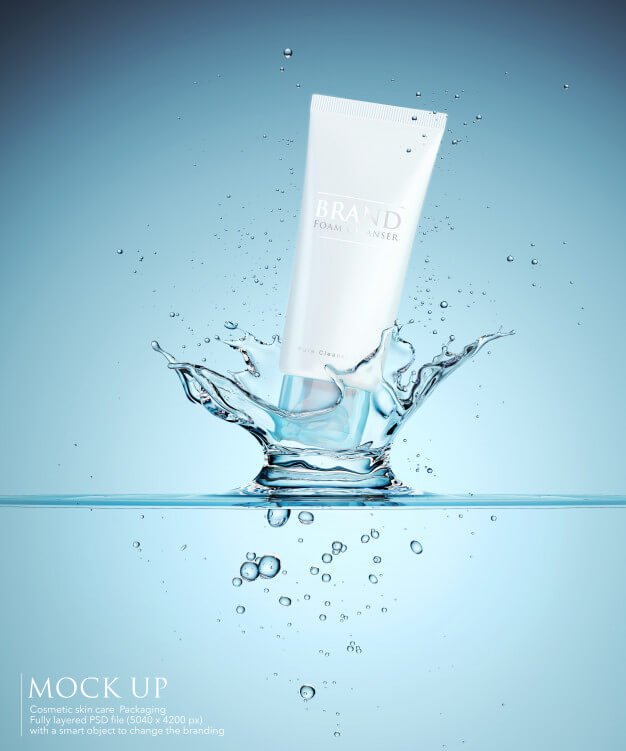 Cosmetic tube mockup template with splashing of water liquid. Premium Psd