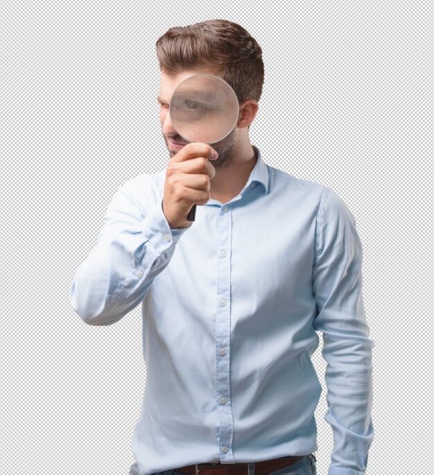 Handsome young man with magnifying glass Premium Psd