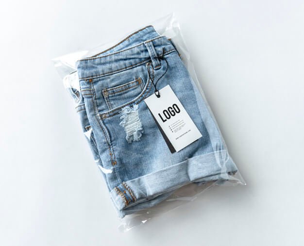 Ripped jean shorts with a tag mockup Free Psd