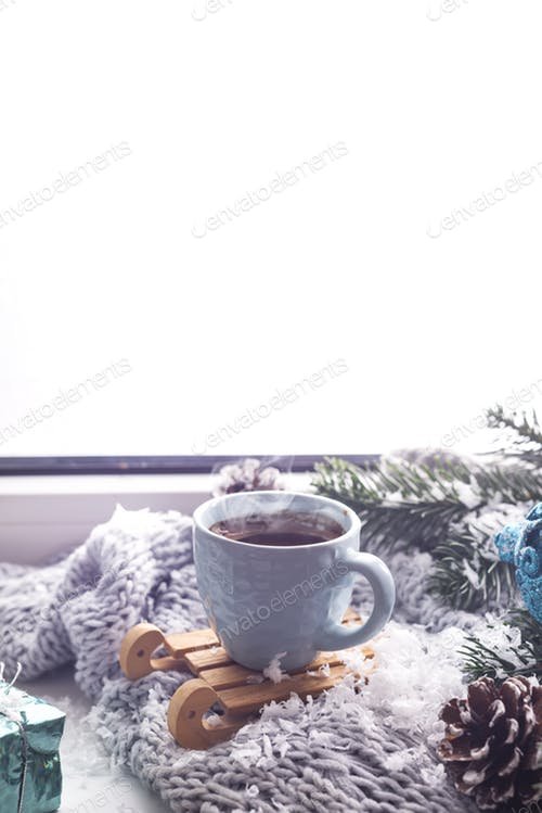 A Cup Of Coffee Is Placed On The Woolen Blanket Mockup.