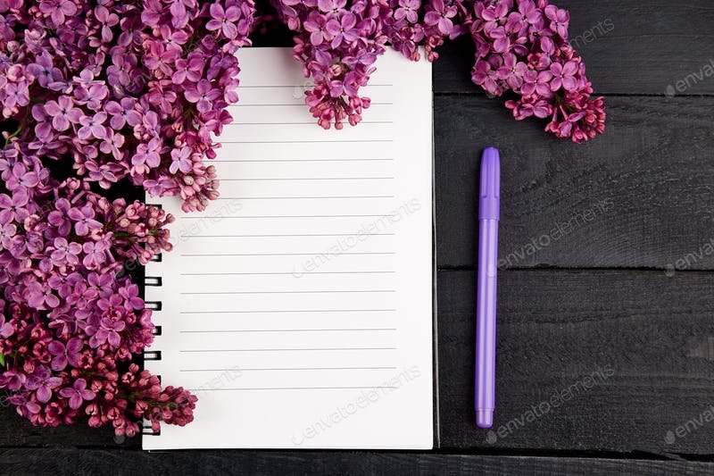 A Dairy And Pen Placed Near A Bouquet PSD Template.
