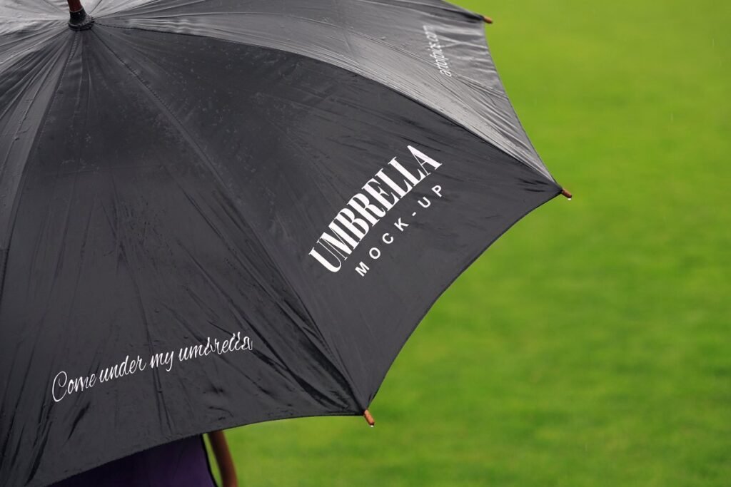 A Man Under A Black Umbrella PSD Mockup.