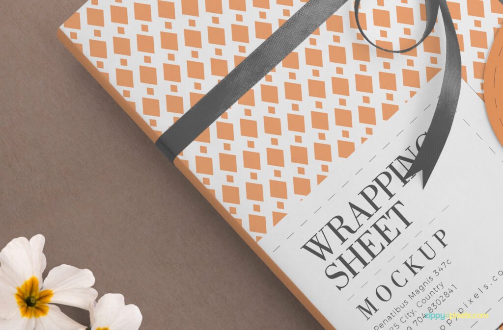 Book Wrapped with an Orange Wrapping Paper PSD Mockup