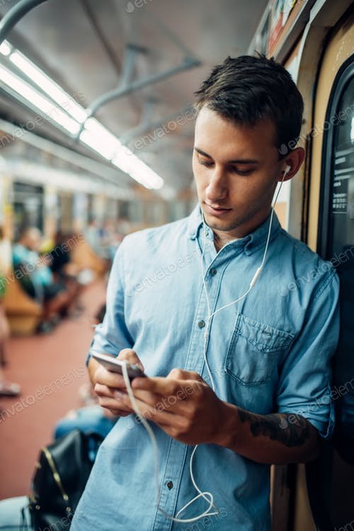 Boy Using Mobile Phone On Metro PSD Format Mockup