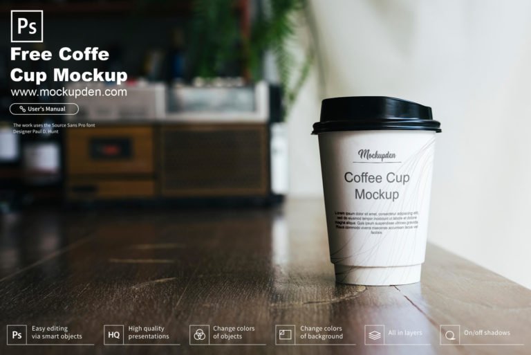 Free Coffee Cup On a Table Mockup PSD Template