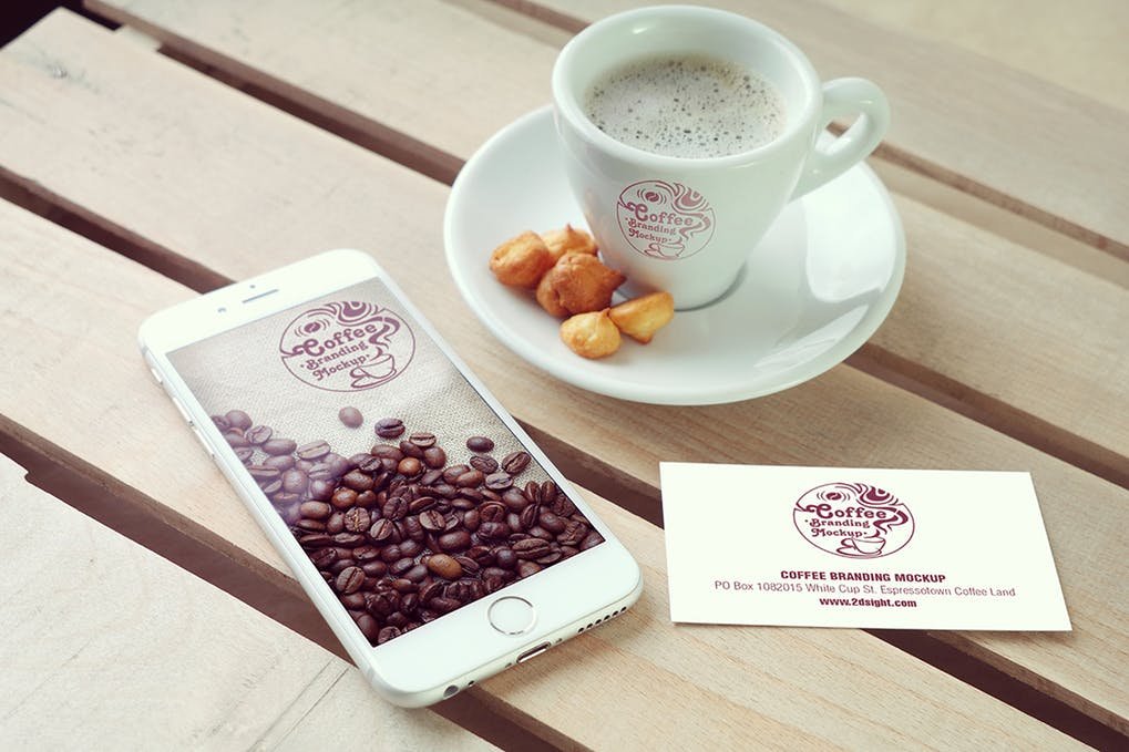 Coffee placed on a wooden table inside a Cafe PSD Mockup