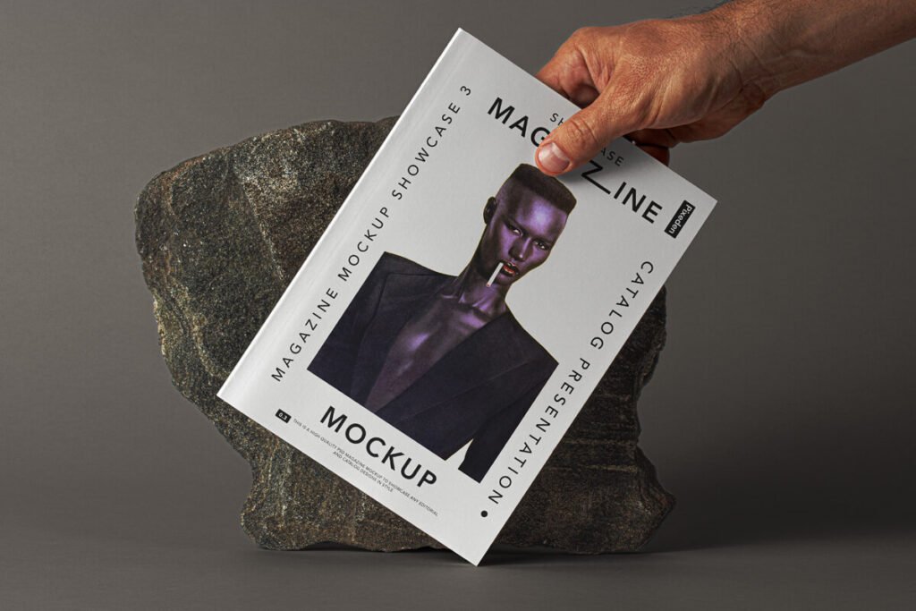 Hand Holding Free Magazine Mockup Showcase PSD Template