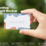 Free Girl Holding Business Card Mockup PSD Template