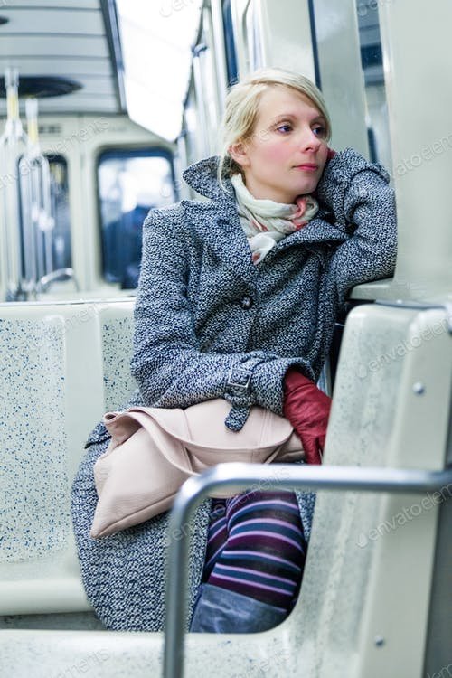 Girl Sitting Inside Metro Station Mockup