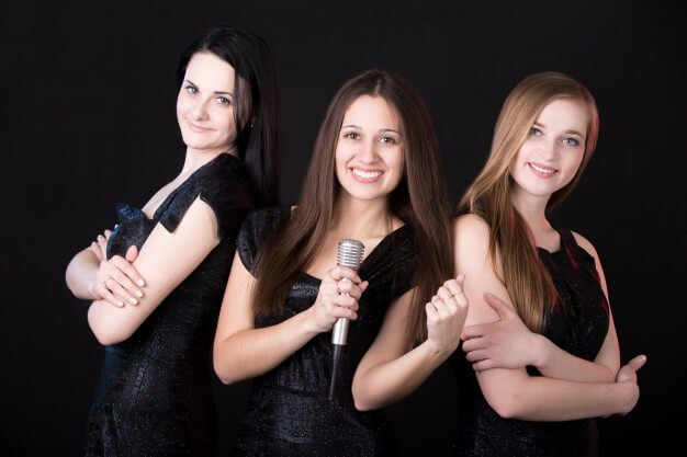 Girls music band with microphone Free Photo