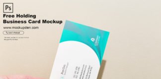 Free Holding Business Card Mockup PSD Template