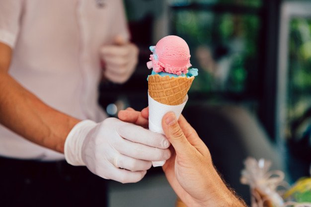 Ice Cream Vendor Serving Ice Cream PSD