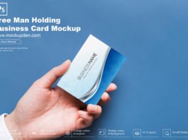 Free Man Holding Business Card Mockup PSD Template