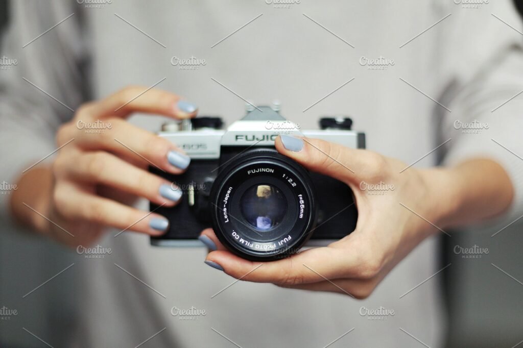Man Holding Camera On Hand PSD File Illustration