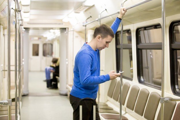 Metro passenger Picture Using Smartphone Inside Metro Rail