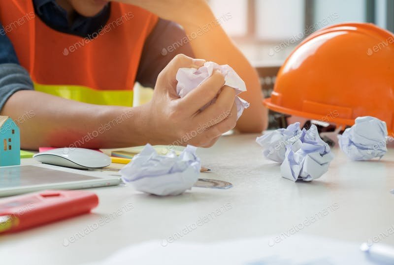 Rough Paper And Orange Hat On White Table Mockup Illustration