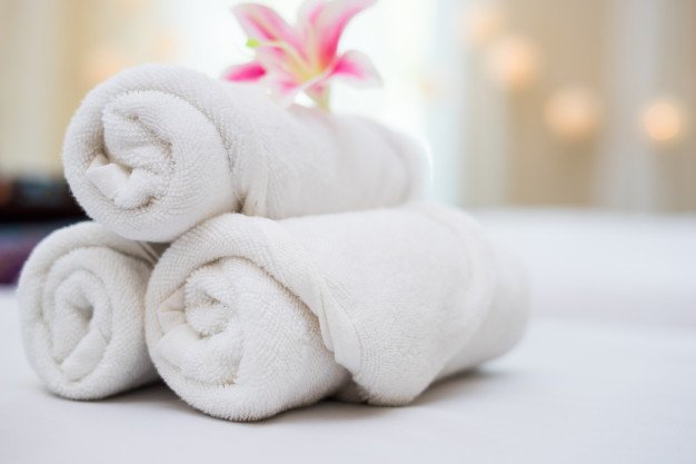 Three White Spa Towel With Pink Orchid