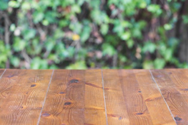 Wooden Table on Garden Mockup