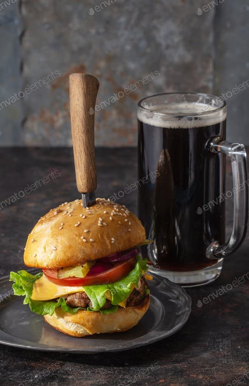 A Big Sized Jug Filled With Beer And A Hamburger Mockup. 