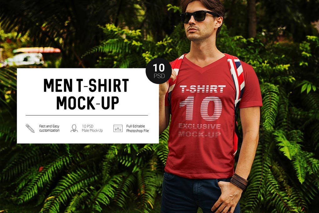 A Man Standing In A Park Wearing A Red Colored T-shirt Mockup. 