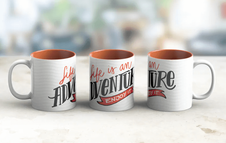 A Set of Three Travel Mug Mockup