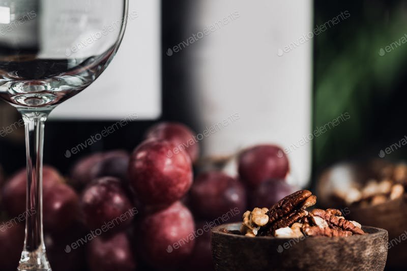 A wine Glass Placed With Grapes PSD Template