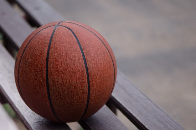 Basketball Placed On A Wooden Bench PSD Mockup