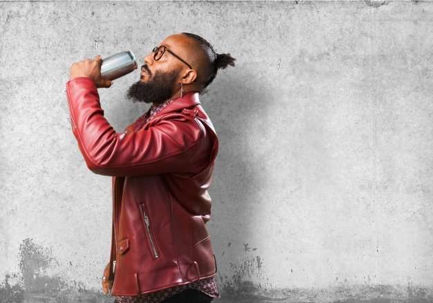 Bearded Man having an Energy Drink PSD