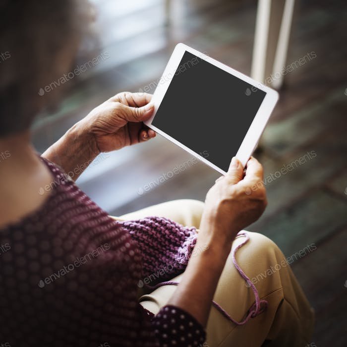 Digital Tablets In Women's Hand PSD.