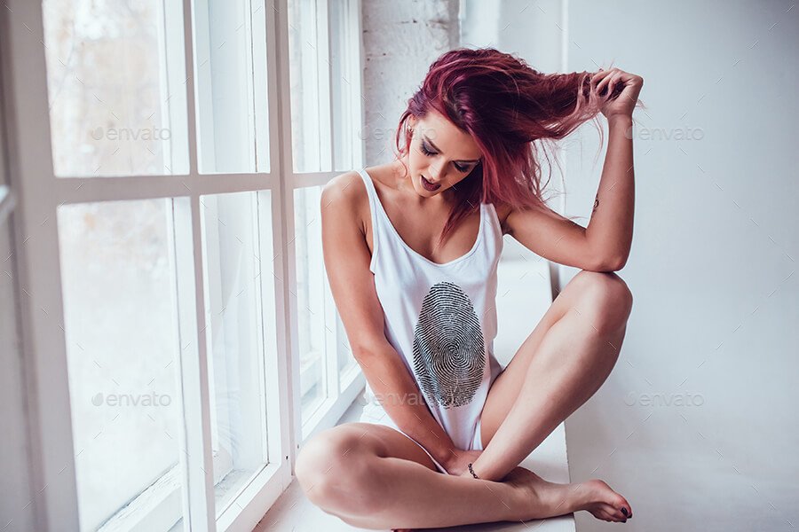 Female In Tank Top Sitting On The Window PSD