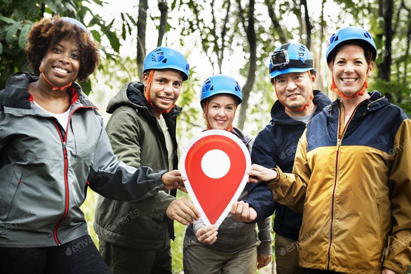 Five Friends Wearing Light Blue Safety Helmet And Holding Check Point On Hand Mockup