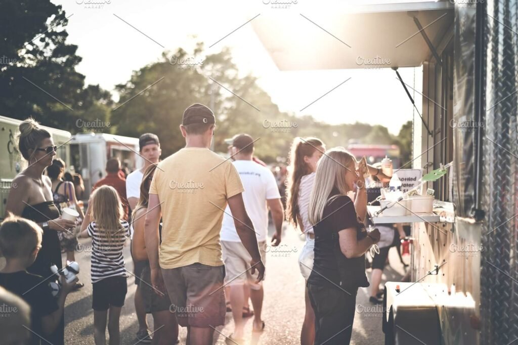 Food Truck In A Crowded Area In Summer Mockup.